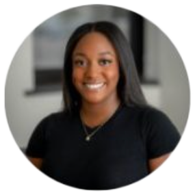 Smiling person in a black shirt.