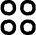 Four black circles arranged in a two-by-two grid
